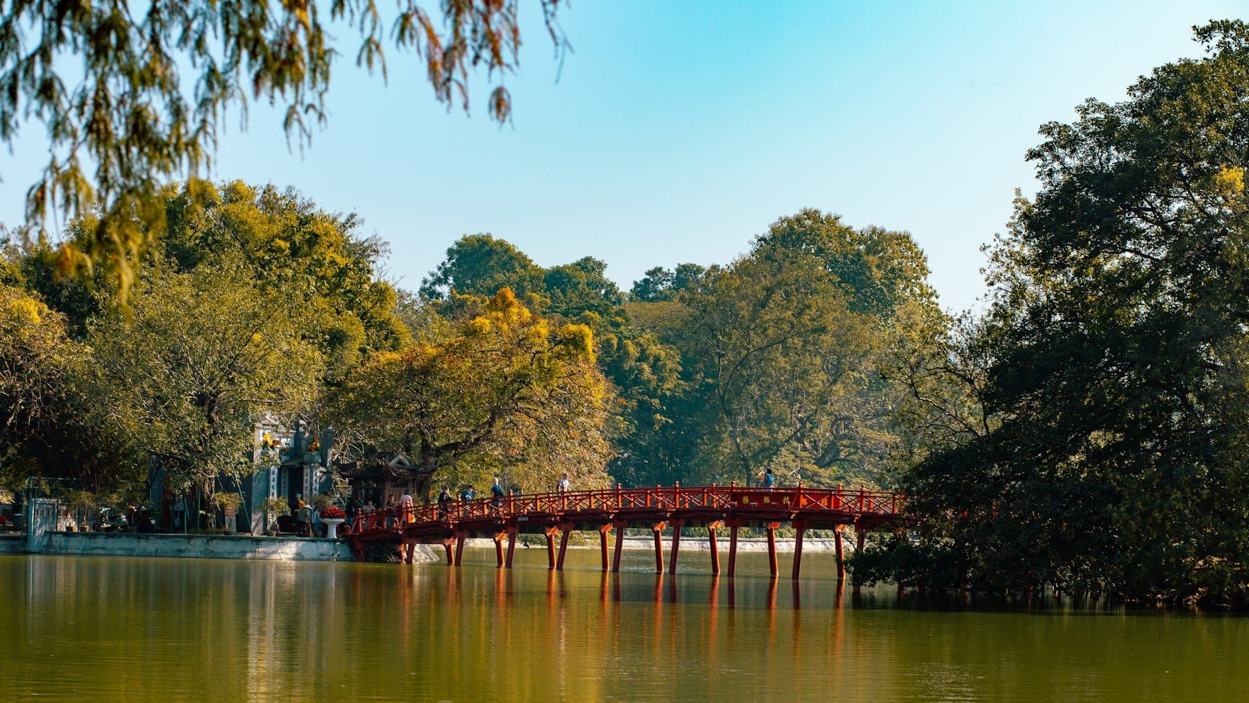 The Húc red wooden bridge over Hoan Kiem Lake in central Hanoi
